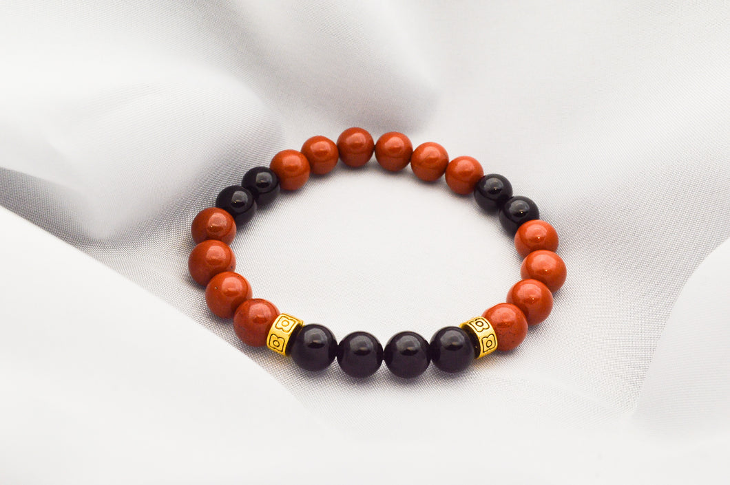 Red Jasper and Onyx with golden accents